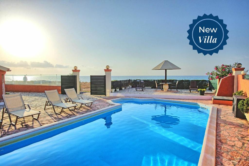 Almiros Beach Villa | Beach Villa Athanasia - villa with private pool on the beach by PosarelliVillas