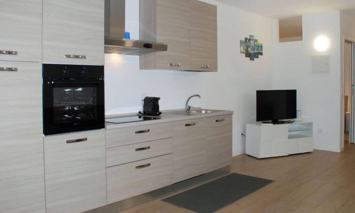Bissone Apartment | Charming Gardenview App. 102 by Interhome