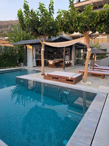 Saronida House | Stergiou Luxury Apartments με κοινη πισινα