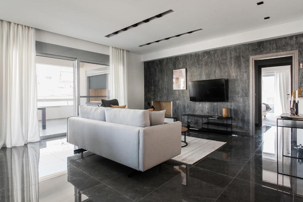 Palaio Faliro Apartment | Teal Faliro House by UPSTREET