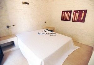 Unique stone villa with a swimming pool and sea view in Koundouros