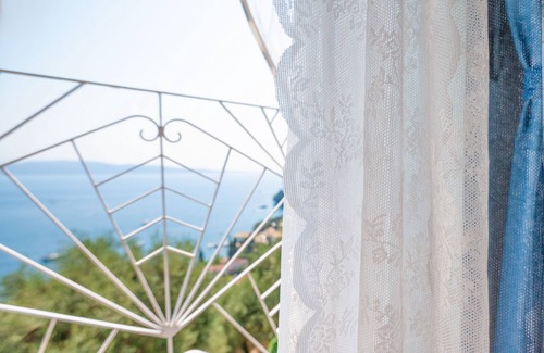 Vlachatika House | Penelope Stone: Charming 2-story House above Kalami, Corfu