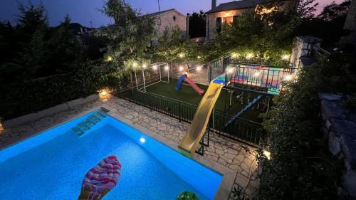 Limni Villa | Splendid Gouvia Villa 3 Bedrooms Villa Yiarios Private Children's Playground