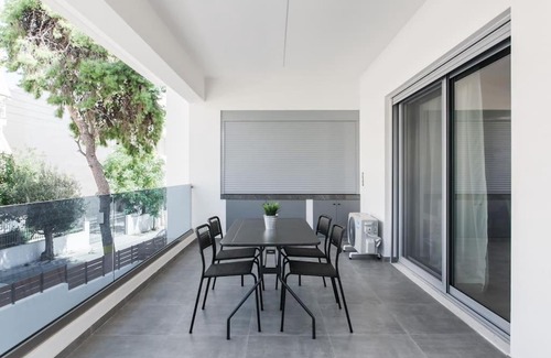 Palaio Faliro Apartment | Teal Faliro House by UPSTREET