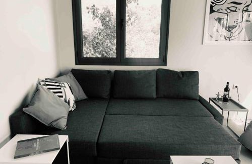 Archangelos Apartment | A designed loft studio a minute walk to the beach