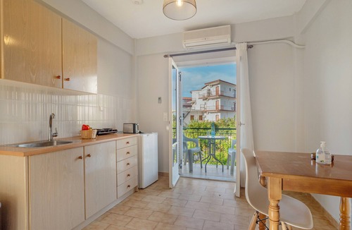 Poros Apartment | Apartment ' with Shared Garden, Wi-Fi and Air Conditioning