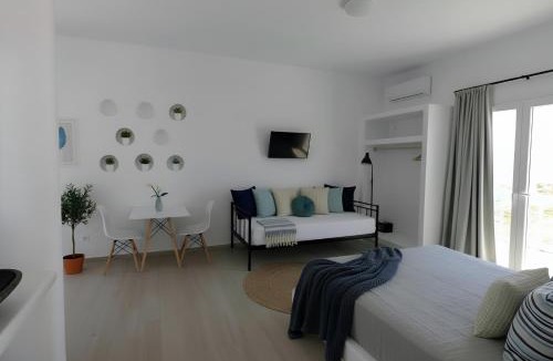 Plaka Apartment | Beachfront Private Suites at Kalais - Stunning Sea & Sunset Views, Bus Stop Outside, Easy Naxos Town Access, Free Beach Chairs