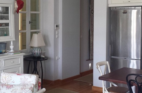 Poros Apartment | Beautiful architect-renovated residence located directly on the port of Poros.
