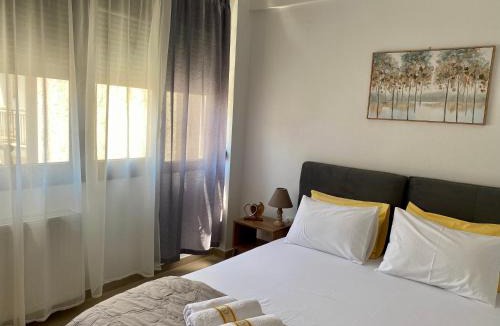 Edessa Apartment | Central & Riverfront Room 3