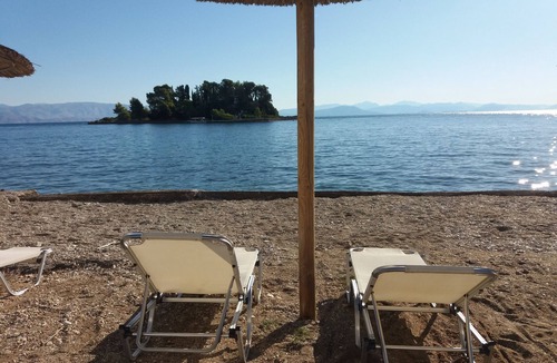 Perama Villa | Durrell Corfu Strawberry-pink Villa