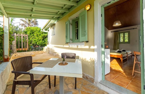 Ag. Georgios House | Holiday Home 'Seafront Studio Stefan' with Sea View, Private Terrace and Air Conditioning