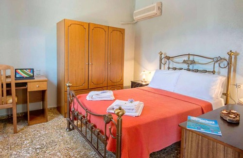 Longos Apartment | Located in the most enviable position, with uninterrupted views of Loggos Harbour and the sea, sits