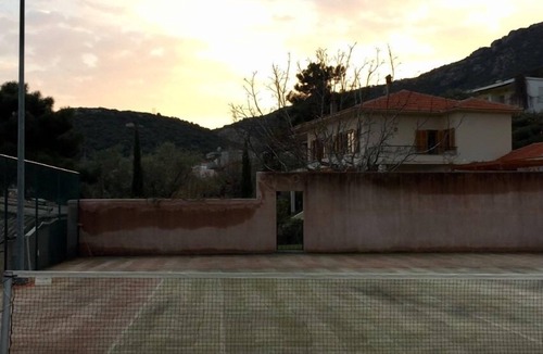 Palaio Tsifliki House | Luxurious Villa, designer's pool, lighted tennis court, olive grove, sea views.