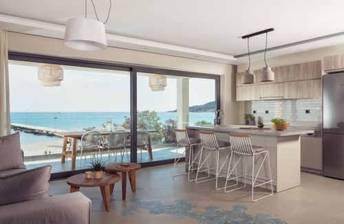 Alykes Apartment | Maritimus Excelsior Suites 2 right onto sandy Alykes Beach