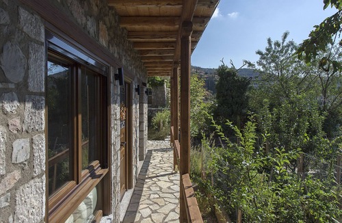 Arachova Apartment | Milia Room. Spacious and autonomous, ideal for a couple.