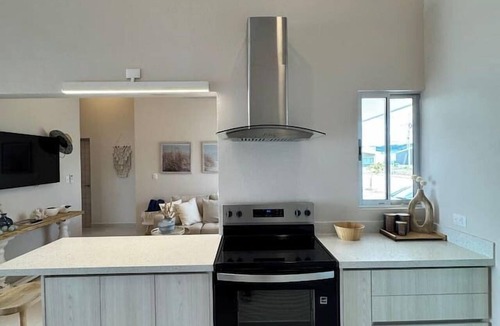 Sardinal House | Modern 3BR 2BA Retreat for 5/Gated Community w/Pool, Gym & Office