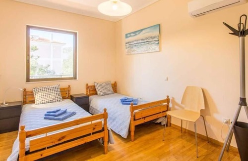Legrena Apartment | Modern Condo at the Beach