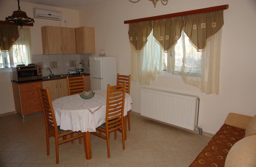 Ag. Georgios Apartment | 'Nefeli Apartment Ground Floor' with Sea View, Garden & Wi-Fi