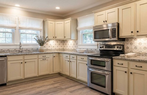 Cedar Falls House | Peaceful Renovated Home with Deck on Half Acre!