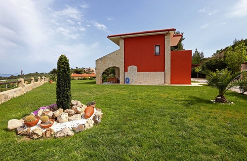 Pefkochori Villa | Pefkochori villa with a stunning panoramic view and a waterfall private pool.