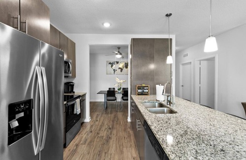 Deerwood Apartment | Poolside Bliss: Stylish 1BR Unit in Resort Complex