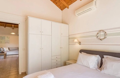 Lefktron Villa | R 3372 Apartmen Dyson Garden View [65 m²] With Coffee Facilities ,Veranda & Air Conditioning.