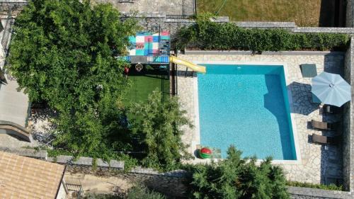 Limni Villa | Splendid Gouvia Villa 3 Bedrooms Villa Yiarios Private Children's Playground