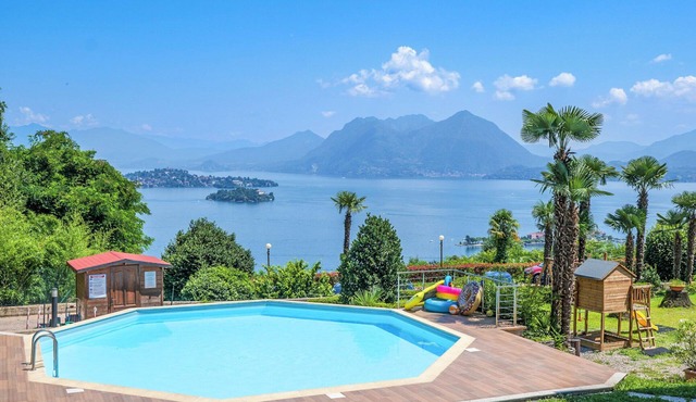 2-room apartment with balcony and terrace in an Art Nouveau villa with communal pool