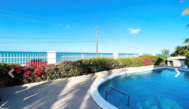 Beach, Ocean View Pool, King Bed - Walking distance to Restaurants & the Beach!