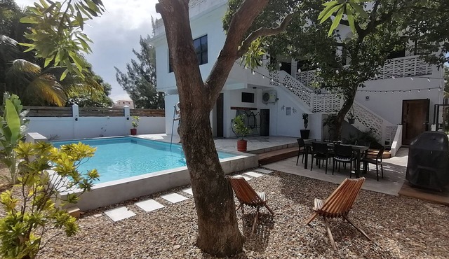 Downtown Dangriga. Entire property. Private pool. Sleeps 20. Handicap Accessible