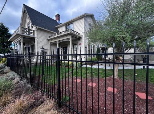 HISTORICAL JOHN RAST HOUSE with Ev station