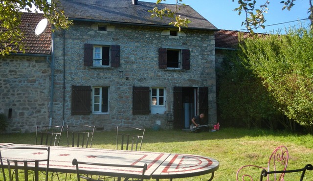 House between fields and forest with a large enclosed garden in a hamlet in the Creuse region