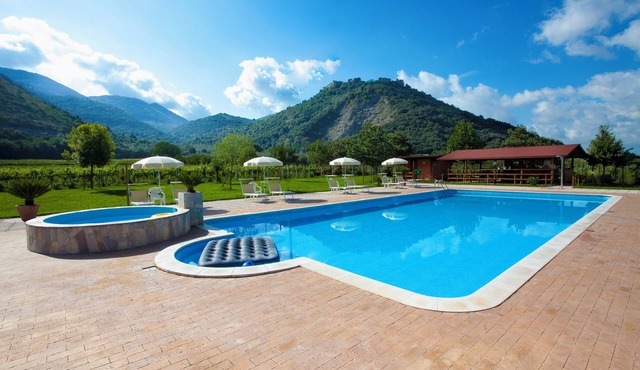 Large apartment in a medieval stone Court, terrace, great view, pool use