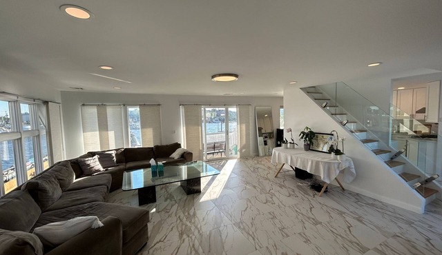 Luxurious Amenity Filled Water-Front Home in Family Friendly Neighborhood.