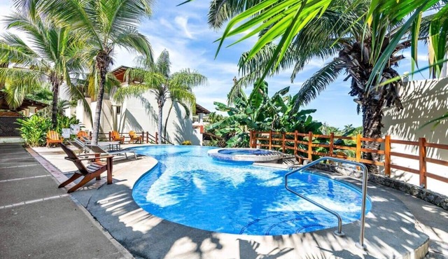 Modern Split-Level 2-Bedroom Condo with Pools, Terrace & Easy Beach Access