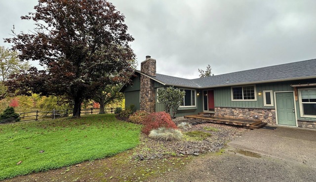 Spacious 4-bedroom home centered in the countryside only 6 minutes from downtown