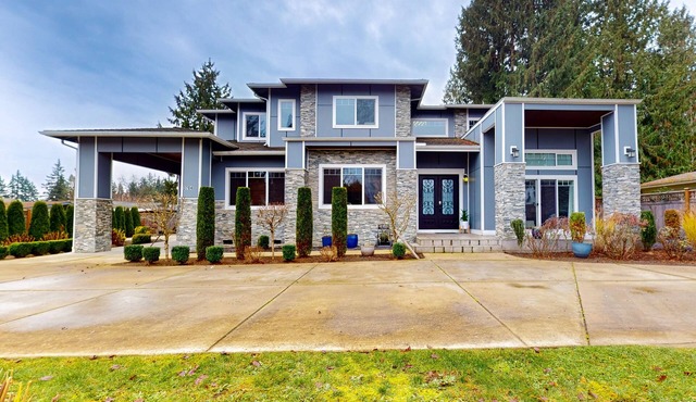 Spacious & conveniently located home with swim spa & two kitchens