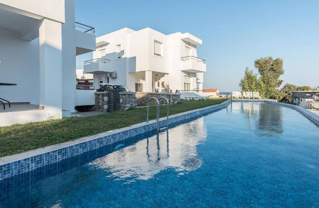 Attractive Holiday Home in Gennadi with Shared Swimming Pool