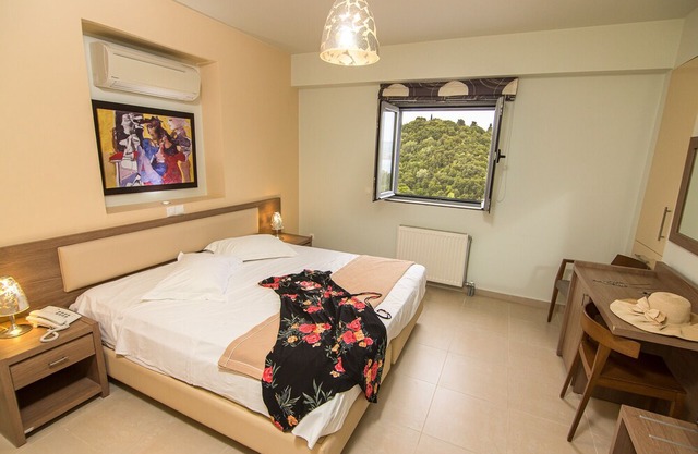 One Bedroom Apartment with a breezy Sea-View balcony. Breakfast included.