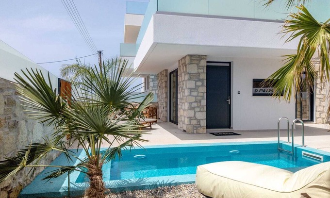 Kalathas Villa | Villa Happiness is a luxurious retreat that harmonizes sustainable living