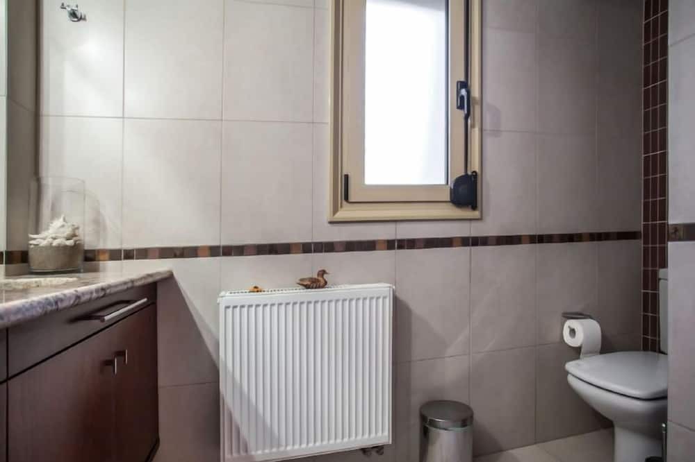 Photo of Bathroom in Roussospiti